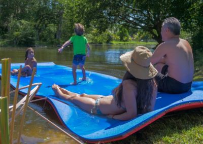 Family using SOWKT floating mat