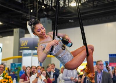 woman hanging on rope performing