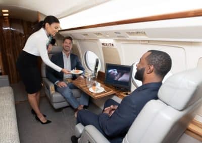 Businessmen in private jet