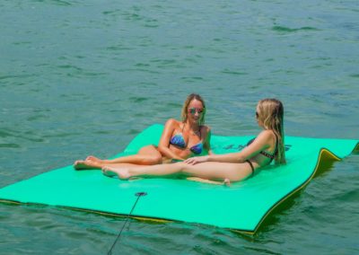 ladies using the SOWKT floating mat